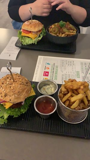 Cheese burger, fries and chili fries at Attila Hildmann Organic Snackbar I in Berlin
