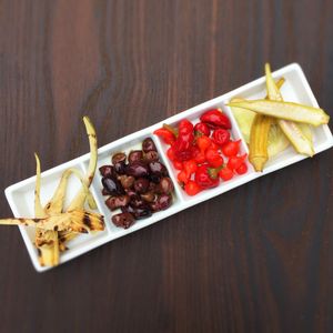 Vegetable Antipasti - grilled artichokes, taggiasca olives, sweet & hot peppers, house-made pickled vegetables at Mediterranea Restaurant & Bakery in Atlanta