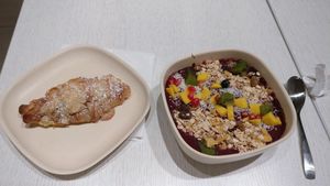 Açai bowl Hawaii and almond croissant at Laelo in Paris