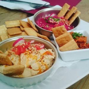Delicious plate of assorted hummus. at La Raposa del Poble Sec in Barcelona