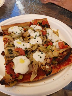 Pizza with homemade vegan mozzarella  at Moab Kitchen in Moab