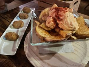 Bravas and croqueta  at Integral in Formentera