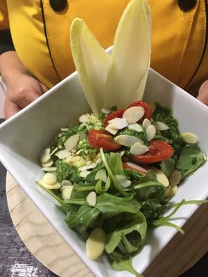 Ensalada de mijo con tomates asados, pesto de apio y almendra  at Integral in Formentera