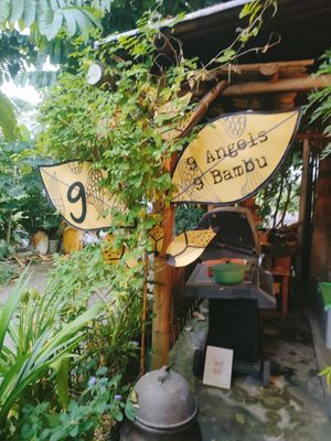 The entrance is tucked away at 9 Angels Warung in Ubud