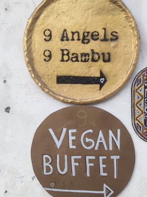 Signage at entrance from street at 9 Angels Warung in Ubud