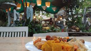 outside in the garden at 9 Angels Warung in Ubud