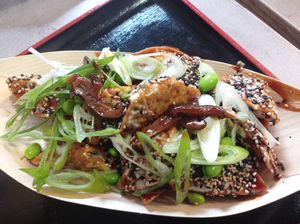 Gyoza dumplings with sweet sauce, edamame, and green vegetables at Foodstock  in Bratislava