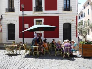The outdoor tables in Pla de la Parroquia. at Petite Sophie in Mahon