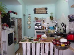 Interior of kitchen. at Petite Sophie in Mahon