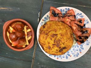 Tortilla and plant “albóndigas" at Petite Sophie in Mahon