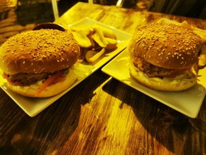 Burgers with fries at Petite Sophie in Mahon