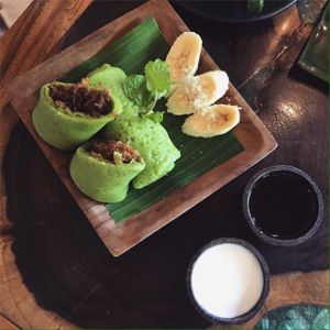 pandan pancakes with coconut  at Atman Nourish Kafe in Ubud