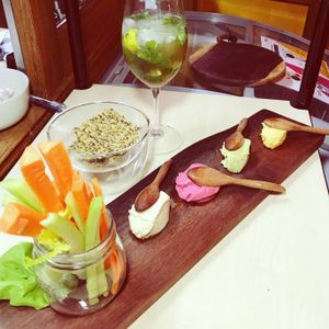 Hummus platter variety with fresh crunchy veggies and raw crackers at Barefood Bangkok in Bangkok