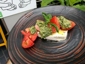 Fresh Almond NutCheese caprese with raw pesto sauce. at Barefood Bangkok in Bangkok