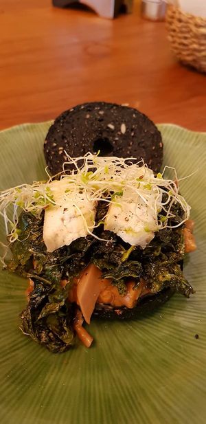 Opened face Kale Porcini sandwich top with Classic pure NutCheese. at Barefood Bangkok in Bangkok