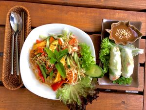 organic noodles with vegetables and organic tofu with spring rolls in a homemade peanut butter sauce  at Chay Long in Berlin