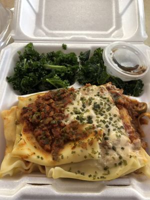 Lasagna and Caesar kale salad  at Universal Love Vegan Cafe  in Columbia