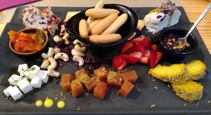 Cheese platter with fruit and crackers at Mapa Verde in San Sebastian