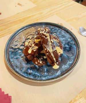 Brownie de chocolate con crema de cacahuete y mousse.   at Mapa Verde in San Sebastian