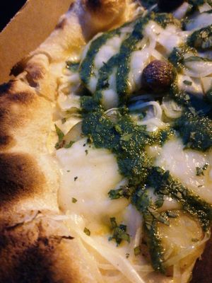 Pornokartoffel pizza with rocket pesto sauce at Zerostress Pizza - Friedrichshain in Berlin
