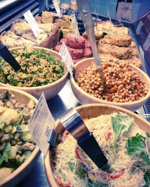 Full fridge of salads, burgers, pies and desserts at Honest2Goodness market. 
 at Shoots and Roots in Dublin