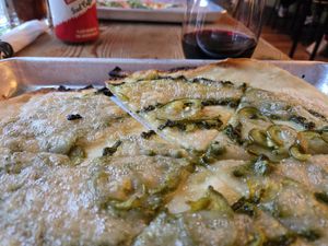 Basil pesto sauce, candied jalapeños, vegan cheese on a gf crust. Yummy! at The Couch Tomato  in Manayunk