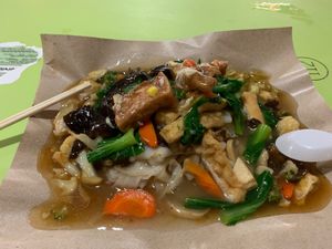 Generous portion of vegetarian Hor Fun . Customised to omit mock meat. Boss added extra tofu, Tau pok and veg  at 3 Veg Rice 三菜白饭 - Ang Mo Kio in Northeast Singapore