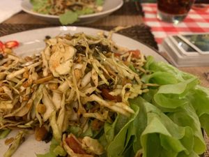 Best salad ever - fermented tea salad. Peanuts, butter lettuce, cabbage, and more - so good and unlike anything we’ve ever had before. at Rad Rabbit in Chiang Mai