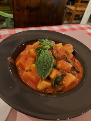Gnocchi in tomato sauce with black olives and capers at Rad Rabbit in Chiang Mai