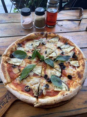 Pizza with olives and aubergine   at Rad Rabbit in Chiang Mai