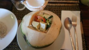 Green Curry inside fresh Coconut at Rad Rabbit in Chiang Mai