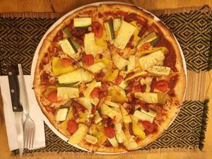 large Fresh Farm pizza with extra bacon and pineapple and whole wheat crust at Rad Rabbit in Chiang Mai