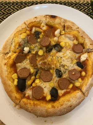 Pizza with vegan sausage at Rad Rabbit in Chiang Mai