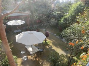 Outdoors seating at Rabsel Garden Cafe at Shechen Monastery in Kathmandu