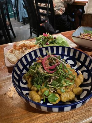 Gnocchi and tapas with beans and avocado  at Rainbow Cafe in Ella