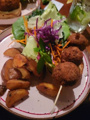 Build a burger. Curried Meatless balls with wedges. at Rainbow Cafe in Ella
