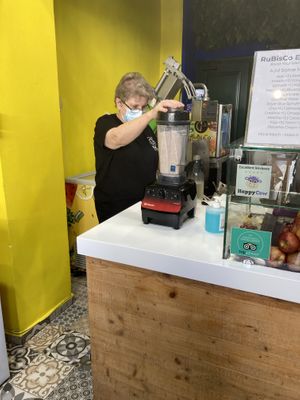 Making fresh almond milk at RuBisCo Cold Pressed Juice in Rhodes