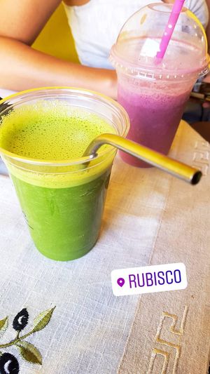 Green smoothie and berry smoothie at RuBisCo Cold Pressed Juice in Rhodes
