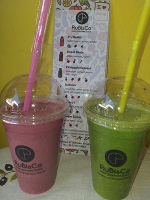 Smoothies... Berries. Super Green. Delicious 😋 at RuBisCo Cold Pressed Juice in Rhodes