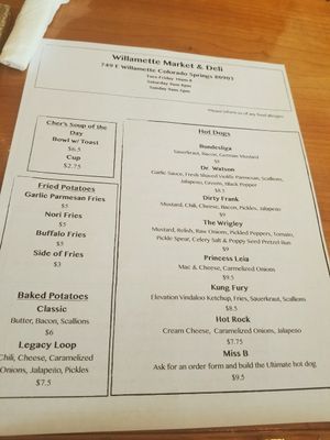 front of menu everything is vegan at Willamette Market & Deli in Colorado Springs