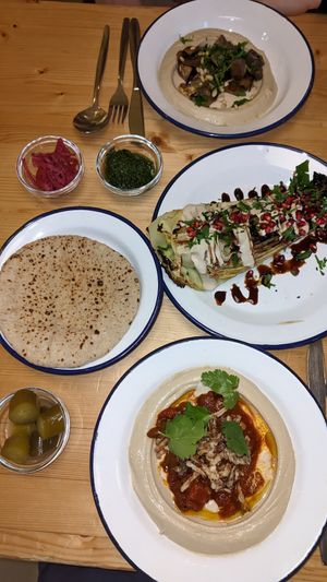 Current specials: Cabbage (right) and a green bean & fried onion hummus (bottom) at Mashery - Hummus Kitchen in Cologne