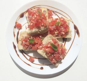 Bruschetta of Tomato, Garlic & Basil on Balsamic Glaze at 143V in Cork