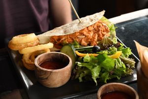 Jackfruit wrap with onion rings at Kismet Restaurant & Lounge in Ubud