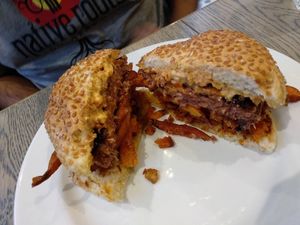 Caribbean burger. The B12 burger and maple bacon were delicious 😋 at Bread Meats Bread - Great Western in Glasgow