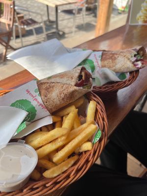 Hummus falafel wrap & chips with vegan tahini  at Falafel Xpress in Chester