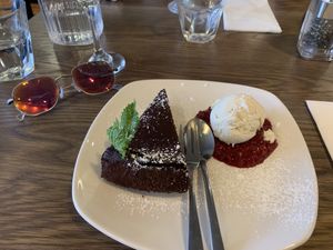 Vegan chocolate torte with raspberry compote and soy vanilla ice-cream at Liberty Grill in Cork