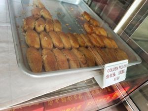 Golden pillow (pineapple) at House of Tau Sar Piah in Central Singapore