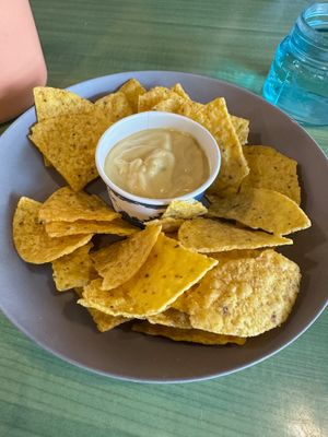 Tortilla chips and nacho cheese at Juice Pharm in Duluth