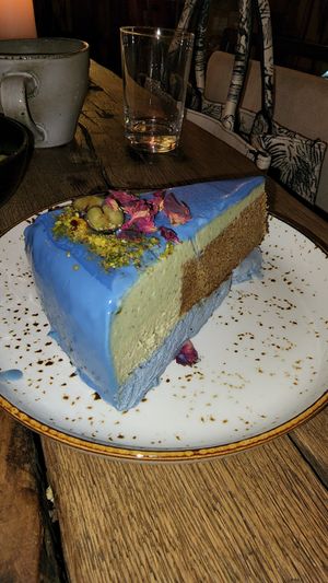 Blueberry cake with blue spirulina at Seva Table in Dubai