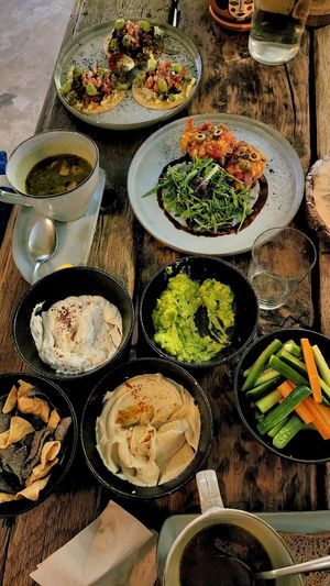 Sharing is caring with maca (trip dip), cod toast, macrobiotic healing soup with mushrooms at Seva Table in Dubai